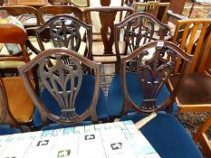 A SET OF FIVE SHIELD BACK DINING CHAIRS
