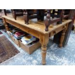 A LARGE PINE KITCHEN TABLE WITH END DRAWER.