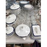 BLUE BORDERED DINNER WARES TOGETHER WITH WINE GLASSES