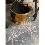 A BRASS COAL SCUTTLE