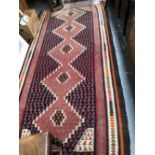 A TRIBAL KELIM RUG 302 x 151 cm