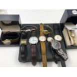 A COLLECTION OF WATCHES TO INCLUDE ACCURIST, SEKONDA, QMAX, ETC.