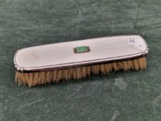 A ART DECO SILVER AND ENAMEL CLOTHES BRUSH, THE WHITE GUILOCHE ENAMEL TOP SET WITH JADEITE JEWEL ,