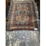 AN ANTIQUE CAUCASIAN RUG 142 x 104 cm