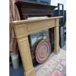 A PAINTED PINE FIRE SURROUND