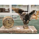 FRENCH ART DECO EAGLE CLKOCK WITH ENGINE TURNED FACE DECORATION ON ED MARBLE BASE AND GLIDED SPELTER