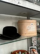 A BOXED BOWL HAT TOGETHER WITH A TRILBY