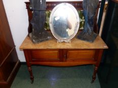 A VICTORIAN TILE BACK WASHSTAND.