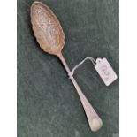 A VICTORIAN SILVER BRIGHT CUT AND SCALLOPED EDGE BERRY OR FRUIT SERVING SPOON WITH GILT BOWL.