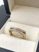 A 9ct HALLMARKED GOLD TWO ROW DIAMOND RING. FINGER SIZE K 1/2. WEIGHT 3.11grms.