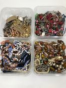 A LARGE COLLECTION OF VINTAGE BEADED NECKLACES ETC.