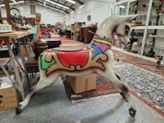 A VINTAGE FAIRGROUND CAROUSEL HORSE IN POLYCHROME COLOUR-WAY WITH METAL MOUNTS AND HANDLE