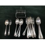 A QUANTITY OF HALLMARKED SILVER CUTLERY AND A SILVER TOAST RACK. GROSS WEIGHT 1268grms.