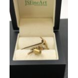 A GOLD MINERS PICK, BUCKET AND GOLD NUGGET BROOCH, NO ASSAY MARKS, ASSESSED AS 9ct GOLD, WITH A