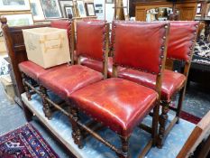 A SET OF SIX LEATHER UPHOLSTERED DINING CHAIRS