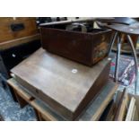 AN OAK CLERKS TABLE AND A VINTAGE TILL.