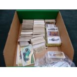 A LARGE QUANTITY OF CIGARETTE CARDS, MANY IN SETS.