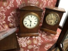 TWO EARLY 20th C. OAK CASED TIMEPIECES BY WINTERHALDER AND HOFMEIER