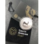 A 2017 SOUTH AFRICAN MINT 1oz FINE SILVER PREMIUM UNCIRCULATED KRUGERRAND, WEIGHT 31.107grms.