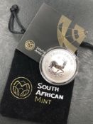 A 2017 SOUTH AFRICAN MINT 1oz FINE SILVER PREMIUM UNCIRCULATED KRUGERRAND, WEIGHT 31.107grms.