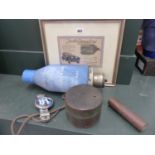 A VINTAGE MILITARY DUMMY AIR CRAFT BOMB, TWO BRASS BOXES, A RAC BADGE AND A MOTORING PRINT.