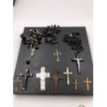 A COLLECTION OF VINTAGE ROSARIES, CRUCIFIX AND CROSS PENDANTS AND CHAINS CONTAINED IN A VINTAGE