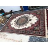 A MACHINE MADE CARPET OF PERSIAN DESIGN 346 x 250 cm