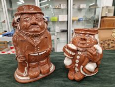 A PAIR OF LATE 19th/EARLY 20th CENTURY SALT GLAZED POTTERY TOBY JUGSM WITH CHARACTERFUL EXPRESSIONS