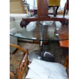 A GLASS AND CHROME CENTRE TABLE