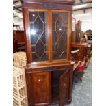 A LARGE EDWARDIAN MAHOGANY FLOOR STANDING CORNER CABINET.