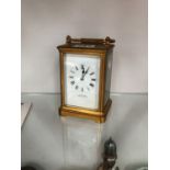 A CARRIAGE CLOCK STRIKING ON A COILED ROD, THE DIAL INSCRIBED FOR EVERSHED OF EASTBOURNE