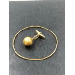 A SINGLE GOLD CUFFLINK, NO ASSAY MARKS, STAMPED 14K, ASSESSED AS 14ct GOLD. WEIGHT 4.12grms,