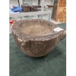 A 19th CENTURY CARVED GRANITE OR MARBLE MORTAR, WITH A WEATHERED DECORATIVE SURFACE