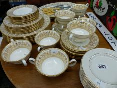 A WEDWOOD GILT DECORATED DINNER SERVICE AND A SET OF FISH CUTLERY