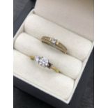 TWO 9ct HALLMARKED GOLD CZ DRESS RINGS. WEIGHT 4.24grms.