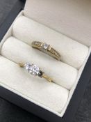 TWO 9ct HALLMARKED GOLD CZ DRESS RINGS. WEIGHT 4.24grms.