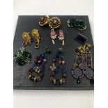 A QUANTITY OF COSTUME EARRINGS AND BROOCHES SOME SIGNED TO INCLUDE BERGERE, HOBE, ETC.