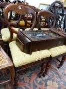 A SET OF FOUR VICTORIAN BALLOON BACK DINING CHAIRS