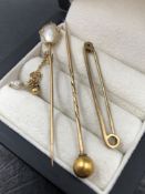 TWO ANTIQUE STICK PINS TO INCLUDE A BAROQUE PEARL EXAMPLE STAMPED 9ct, A BALL TOPPED EXAMPLE, NO