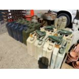 EIGHT VINTAGE JERRY CANS TOGETHER WITH NINE WATER CANS AND FOUR FOLDING MILITARY SHOVELS.