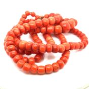 A DOUBLE STRAND OF VINTAGE CORAL BEADS. APPROXIMATE LENGTH 47cms. WEIGHT 106.25grms
