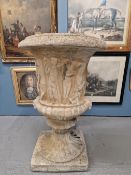 A PAIR OF COMPOSITION GARDEN URNS CAST WITH CLASSICAL FIGURES ABOVE FLUTED SOCLES AND SQUARE FEET. H