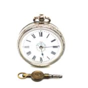 AN ANTIQUE FRENCH SILVER FOB WATCH. CIRCA 19th CENTURY, COMPLETE WITH WATCH KEY. WINDS AND RUNS,