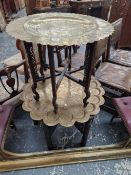 TWO ISLAMIC BRASS DISH TOPPED TABLES ON WOODEN FOLDING STANDS