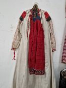 A VINTAGE EMBROIDERED TRADITIONAL SMOCK DRESS WITH SEWN SASH / BELT.
