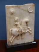 AN INDIAN WHITE MARBLE PANEL CARVED ON BOTH SIDES IN RELIEF WITH HORSE BORN WARRIORS CANTERING BELOW