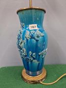 A CHINESE TURQUOISE GLAZED VASE AS A LAMP, THE BALUSTER SHAPED MOULDED WITH BIRDS ABOUT FLOWERING
