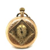 AN ANTIQUE HALF HUNTER TYPE FOB WATCH. THE INSIDE BACK COVER STAMPED 14K, ASSESSED AS 14ct GOLD,