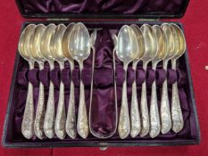 A CASED SET OF TWELVE SILVER TEA SPOONS AND A PAIR OF TONGS BY LAWSON & CO., GLASGOW 1892, TWO