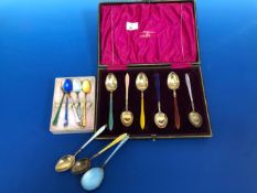 A CASED SET OF SIX SCANDINAVIAN ENAMELLED SILVER GILT COFFEE SPOONS, TWO OTHERS SIMILAR, AN ODD
